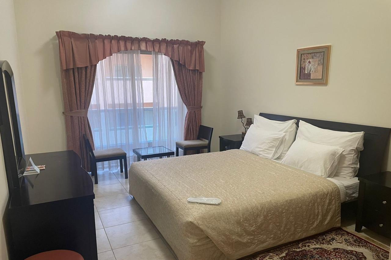 Al Raya Hotel Apartments Дубай Экстерьер фото